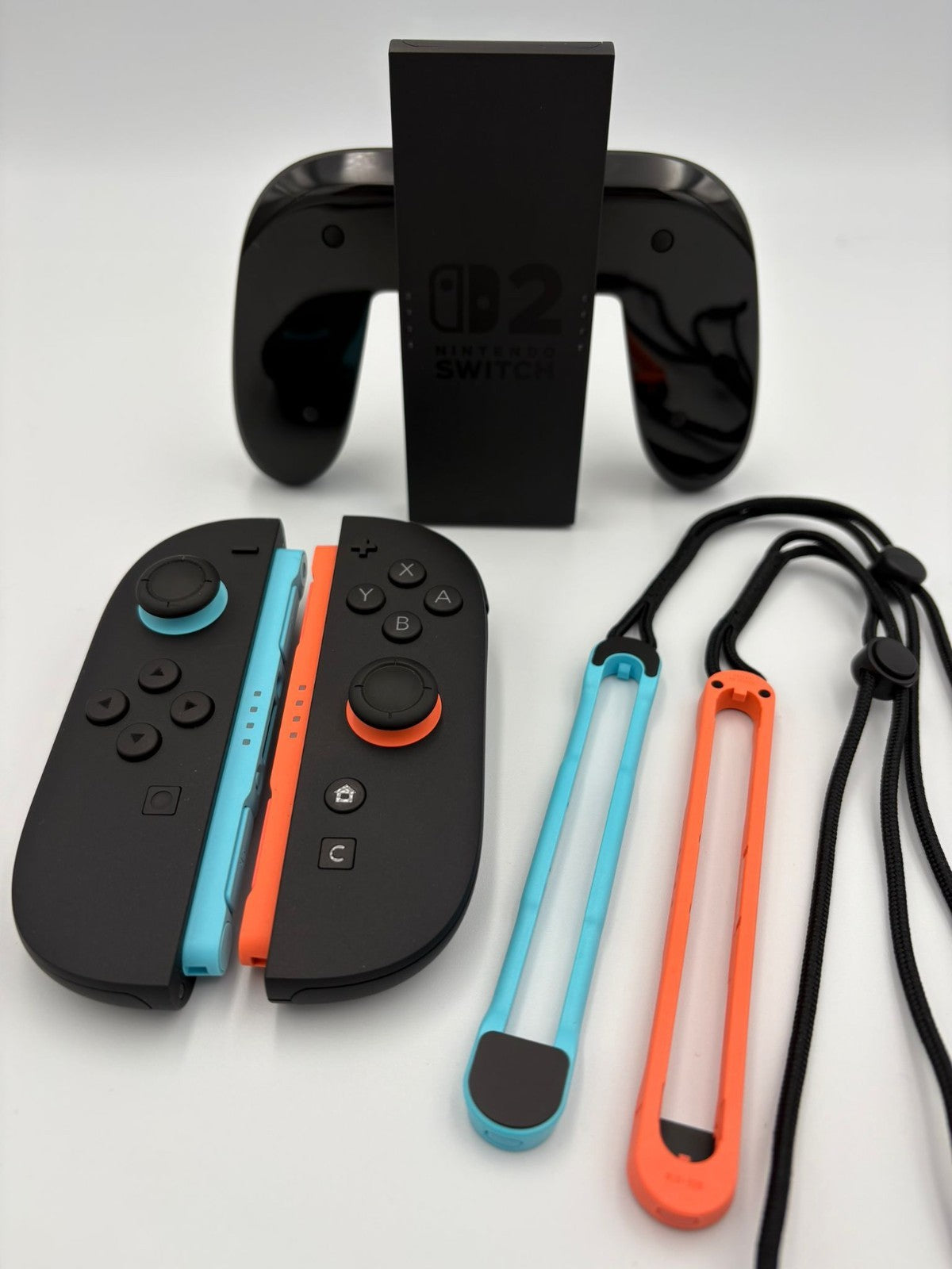 Official Nintendo Switch 2 Joy Con Pair + Grip + Strap Joycons Controller Bundle